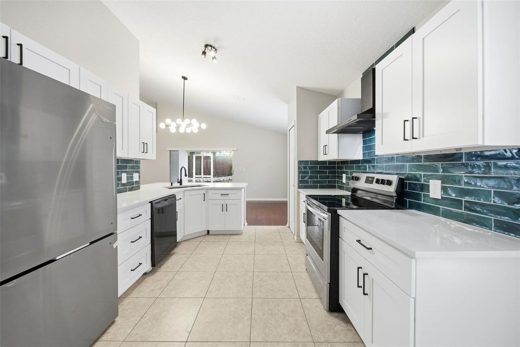 Photo of 245 Hollingshead Loop, Davenport, FL 33896 (MLS # O6405419)