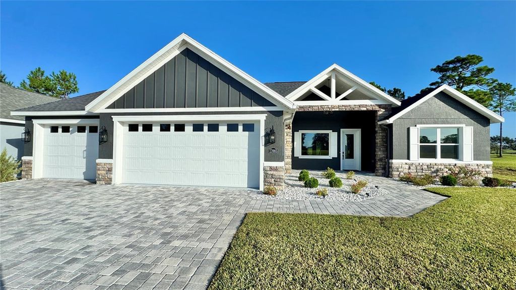 Photo of 17665 SW 61st Lane Road, Dunnellon, FL 34432 (MLS # O6348970)