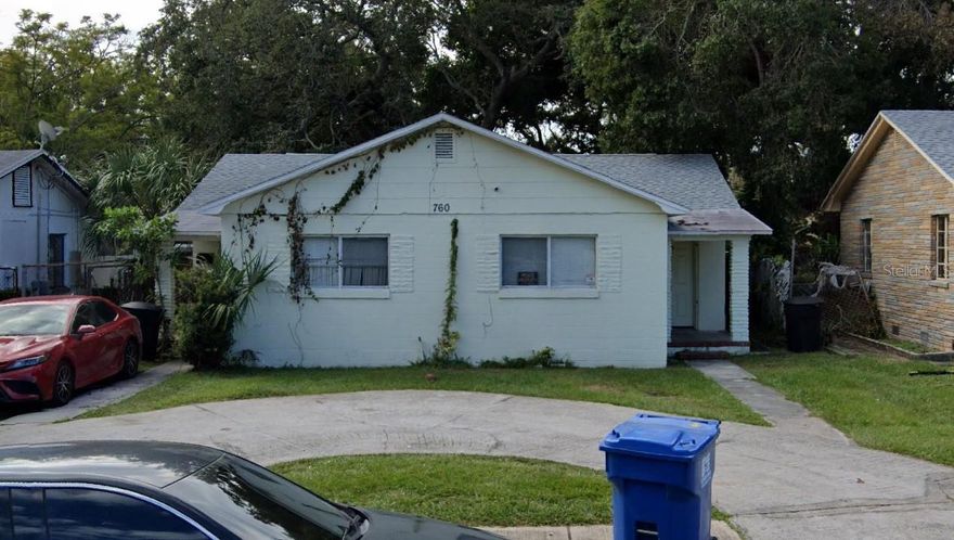Block cash-flowing Triplex just 2 Miles from Downtown St. Pete, featuring two buildings separated by a fence. Ideal for investors seeking strong cash flow and long-term appreciation, it also provides a unique house-hack opportunity: Live in the 4/2 while the other units help you cover your mortgage! The single-story Front Building includes two 2BR/1BA units, with inside utility rooms for washer & dryer, separate electric meters, and driveway parking. Both units are currently leased. The Back Building, accessible via Granville Ct S (off 18th Ave S), is a spacious 4BR/2BA two-story block home featuring the master bedroom and 1 bath downstairs, three bedrooms and 1 bath upstairs, and inside washer & dryer hookups. Conveniently vacant for showings and potential owner-occupants! Don't miss out on this versatile investment opportunity! NO flood insurance required.