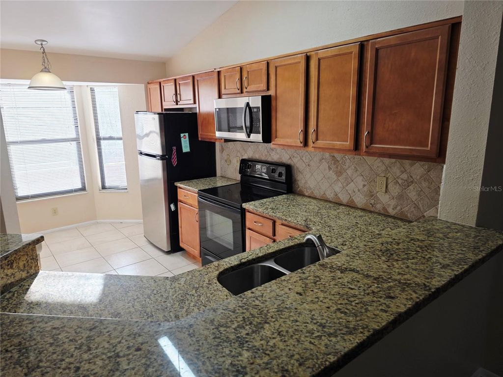 Photo of 7543 Sugar Bend Drive #7543, Orlando, FL 32819 (MLS # O6399264)