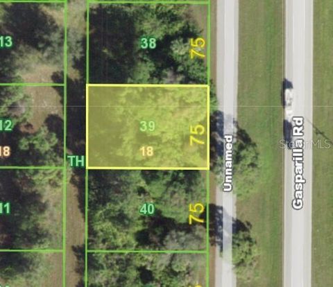 Photo of 10425 Gasparilla Road, Port Charlotte, FL 33981 (MLS # C7516489)