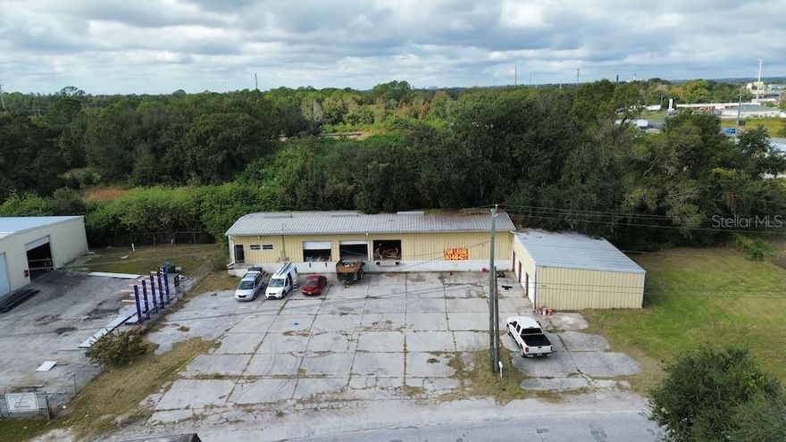 Discover an exceptional commercial opportunity in the heart of Lakeland. This 4,980± SF building on 0.51 acres offers a highly functional layout for automotive, service, or light industrial operations. With multiple service bays, generous ceiling heights, and efficient circulation patterns, the site is engineered for smooth workflow and quick customer turnaround — a significant advantage in today’s service-driven market.

The property features dedicated customer parking for up to 20 vehicles, providing rare convenience and strong curb appeal. The lot is well-configured, allowing for easy ingress/egress and the potential for outdoor storage, fleet staging, or future expansion.

Positioned within a well-established commercial corridor, the location delivers excellent access to downtown Lakeland, US-92, and the Lakeland-Winter Haven metro. The combination of size, functionality, and location makes this an outstanding asset for owner-users or investors seeking a versatile service facility in one of Polk County’s fastest-growing markets.

Likely Allowable Uses:
Automotive service & repair
Fleet maintenance operations
Contractor/trades facility
Warehouse/distribution
Light manufacturing
Retail/office support uses

The site benefits from excellent visibility within the Complex Drive commercial corridor. The building faces active service businesses, providing a strong “destination” identity.