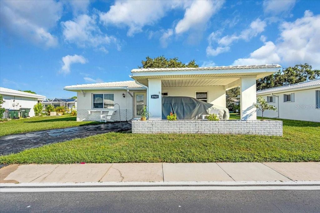 Photo of 8940 Pickwick Road, North Port, FL 34287 (MLS # N6140651)