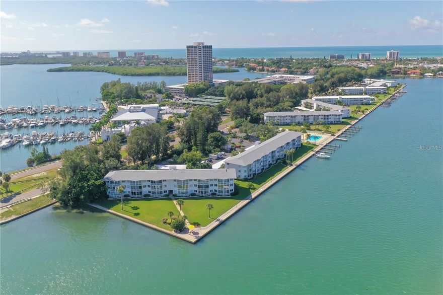 PRIME LOCATION: Sarasota Harbor East is a charming waterfront community exclusively designed for residents aged 55 and above. It boasts an exceptional location with breathtaking views of Sarasota Bay from this first-floor condominium. Historically, Sarasota Harbor has been celebrated as the premier bayfront condominium in Sarasota. This unit features a spacious one-bedroom with a full bathroom and has undergone a complete remodel.  High-impact windows, sliding glass doors, and a new front door enhance the unit’s ambiance. Bosch appliances, quartz countertops and solid wood cabinets, and a clubhouse amenities package, including a fully equipped kitchen, library, and restrooms, contribute to the comfort and convenience of residents. Additionally, a large lap pool with bayfront views provides ample recreational opportunities.  Residents enjoy a range of amenities, including boat slips, elevators, shuffleboard courts, kayak and bike storage, and a covered parking space. A generous number of guest parking spaces are also available. The homeowners’ association (HOA) fees cover various expenses, such as dock maintenance, exterior building repairs, cable and direct TV, heated community pool, internet, exterior maintenance, ground maintenance, exterior pest control, pool maintenance, water, sewer, and trash.  Residents have easy access to popular attractions like St. Armand’s Circle, Lido Beach, and downtown Sarasota. Boat slips are available and can accommodate a 30’ powerboat or sailboat, they are available on a first-come, first-served basis.