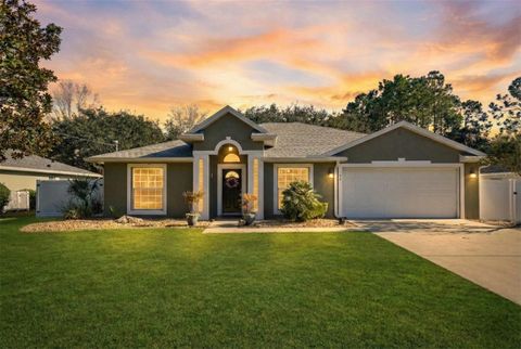 Photo of 56 Brownstone Lane, Palm Coast, FL 32137 (MLS # FC315110)