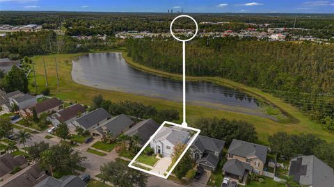 Photo of 1892 Hammock Moss Drive, Orlando, FL 32820 (MLS # O6345526)