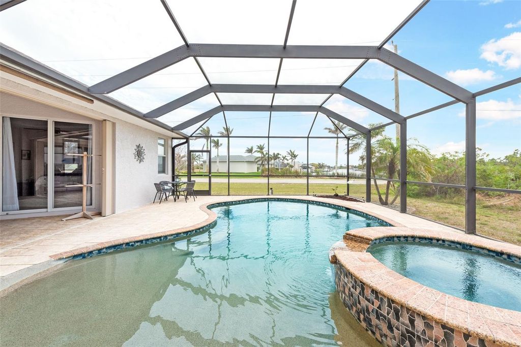 Photo of 8305 Welsford Road, Port Charlotte, FL 33981 (MLS # OM711831)
