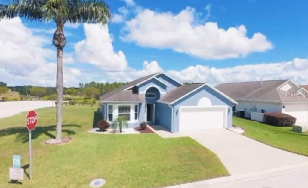 Photo of 550 Fox Loop, Davenport, FL 33837 (MLS # O6349763)