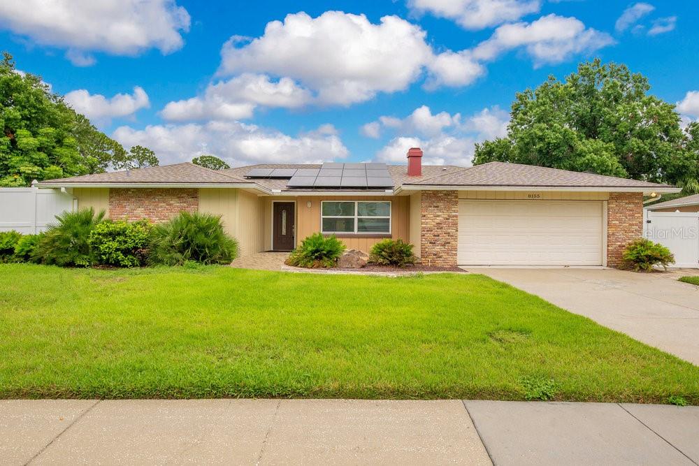 Welcome to this move-in ready 4-bedroom, 2-bath solar powered POOL home in Dr. Phillips! Situated on an oversized lot with no HOA, this property offers space, privacy, and modern upgrades you’ll love. The open-concept floor plan is perfect for entertaining, featuring a spacious living room, family room, and dining area, all centered around a beautiful wood-burning fireplace. The split layout provides a huge, private primary suite with an ensuite bathroom, while the three additional bedrooms and a full bath are located on the opposite side of the home.
Step outside to your personal backyard oasis — a sparkling, screened-in pool and lanai, fully fenced yard, and no rear neighbors create the perfect setting for relaxing or hosting gatherings. Solar panels and solar batteries (fully paid off) keep your electric bills at zero, and an EV car charger is already installed. This incredible home combines the best of Florida living with an unbeatable location close to world-class dining, shopping, theme parks, and top-rated schools. Call today for additional information and to schedule your showing today!