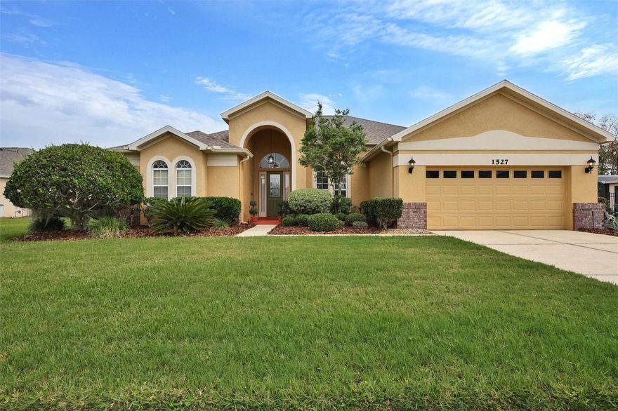 Feast your eyes on this Stunning 5BR/3BA pool home in the sought-after Gated Ashley Cove community. Here you can enjoy 2,781 sq ft of luxury. The home offers a desirable 3-way split-bedroom plan, a Formal living room with a wood-burning fireplace, a formal dining room, and a spacious family room. For those who work from home, there's a separate office with built-in shelving. The kitchen is well-appointed with beautiful granite countertops, a center island, and crown-molded cabinetry. Eat at the comfortable breakfast bar, the dinette, or the dining room. The master retreat boasts a tray ceiling, two walk-in closets, a garden tub, a separate shower, dual vanities, and a set of french doors that lead out to the covered lanai and screened pool. The spacious pool deck, adorned with beautiful brick pavers, is ideal for relaxing and entertaining. The new roof (2023) and AC (2025) provide peace of mind for years to come. Other improvements include: hot water heater (2022), exterior paint (2026), new light fixtures (2022), pool re-screen (2025), and newer appliances (2023 & 2026). The 12 ft ceiling and the 4 sets of french doors give this home a beautiful open appeal. The pre-wired surround sound speakers convey.  This home is move-in ready and waiting for its next owner. All appliances convey. Minutes to Lake Toho, attractions, shopping, hospitals, and expressways.