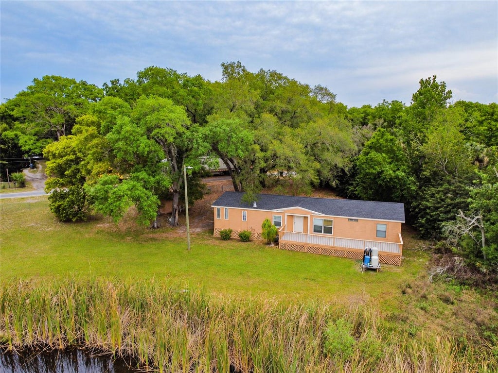 Photo of 1215 E 149th Avenue, Lutz, FL 33549 (MLS # TB8554321)