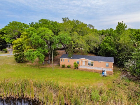 Photo of 1215 E 149th Avenue, Lutz, FL 33549 (MLS # TB8554321)