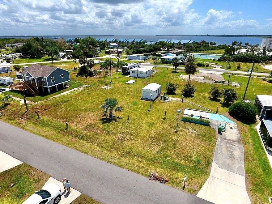 This is the kind of opportunity that rarely hits the market!!! A HUGE triple lot offering exceptional space, flexibility, and potential in one of Southwest Florida’s most underrated waterfront communities. With NO HOA, plus public water and public sewer already in place, you eliminate major building hurdles and costs—making this property truly ready for your vision.
This cleared, level parcel gives you the freedom to design exactly what you want—whether it’s a custom coastal estate, a seasonal retreat, or an income-producing investment. The size alone sets it apart, providing room for additional structures, outdoor living, boat storage, or simply the privacy buyers are searching for today.
Located just moments from the mouth of the Myakka River, you’re positioned for quick access to Charlotte Harbor and the Gulf, with a nearby marina and public boat ramp just a block away—ideal for serious boaters and anglers.
El Jobean itself is rich in history, originally a small fishing village that has evolved into a sought-after coastal enclave known for its deep-water canals and “Old Florida” charm. Today, residents enjoy easy access to parks, ball fields, the Charlotte County Fairgrounds, local events, waterfront dining, and year-round entertainment—all while maintaining that laid-back, boating lifestyle.
Oversized land, no restrictions, utilities in place, and a prime location—this is a standout property in a rapidly growing area. Opportunities like this do not last!!