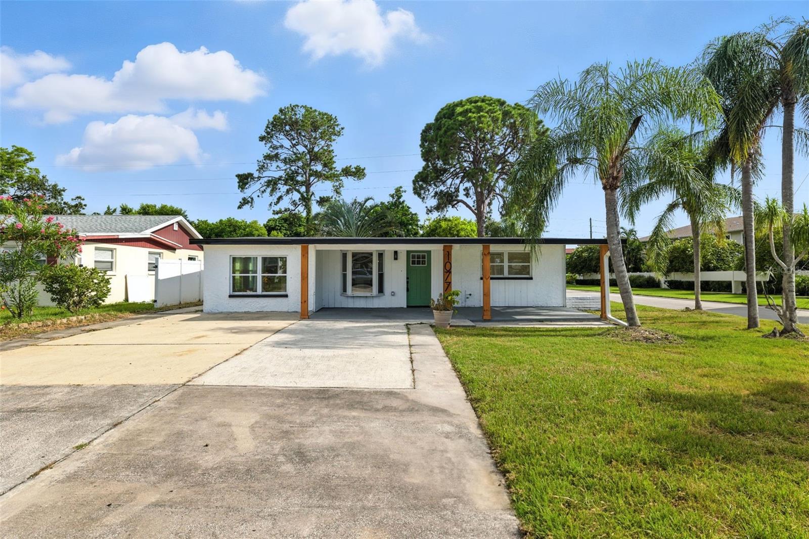 Florida Living at Its Finest – Completely Renovated & Move-In Ready
This meticulously renovated 4-bedroom, 2-bathroom home is perfectly situated in the desirable Seminole Manor neighborhood. Boasting sturdy block construction, oversized lot, none flood zone and no history of hurricane flooding, this home offers peace of mind along with modern comfort.
Step inside to a bright, open-concept layout where the living room, dining area, and family room flow seamlessly into showstopper kitchen. Recently remodeled, the kitchen is a chef’s delight—featuring new shaker-style soft-close cabinetry, sleek quartz countertops and top-of-the-line appliances, including a GE gas stove, Samsung refrigerator and dishwasher. Large peninsula provides the perfect spot for casual dining, while wood style finish, water-resistant luxury vinyl floors add warmth and durability throughout the main living spaces.
The split floor plan ensures privacy, with a spacious primary suite tucked away from the other bedrooms. Primary bedroom includes a large walk-in closet and luxurious en-suite bathroom featuring a walk-in shower, soak in tub, designer tile, and high-end fixtures. Both the primary and second bathroom have been fully remodeled with fresh vanities, modern lighting, and premium finishes.
Home upgrades include Roof 2024, AC 2025 , Water Heater 2025, Plumbing 2025, Sliding door 2025, Several Windows 2025 and New lighting throughout. Outdoors, enjoy a covered front and side porch and a large backyard with room for a pool, RV, boat, or extra vehicles. A versatile shed for storage and functionality.
Centrally located near world-famous beaches, vibrant Downtown Saint Petersburg, and local shops like Sprouts, Publix, and so much more! Don’t forget about the beautiful parks and trails around the city. This home offers the perfect blend of style, comfort, and convenience. Whether you’re hosting gatherings, relaxing in the backyard, or enjoying a quiet evening on the porch, this home is ready to welcome you to the Florida lifestyle.