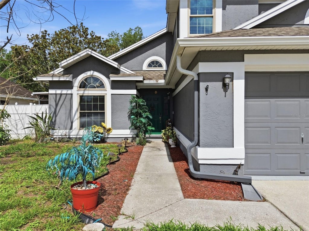 Photo of 1621 Spinning Wheel Drive, Lutz, FL 33559 (MLS # TB8512911)