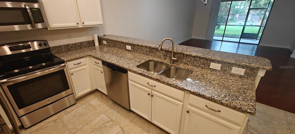 Photo of 8933 Azalea Sands Lane #902, Davenport, FL 33896 (MLS # O6447209)