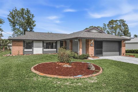 Photo of 34 Wood Haven Drive, Palm Coast, FL 32164 (MLS # FC317386)