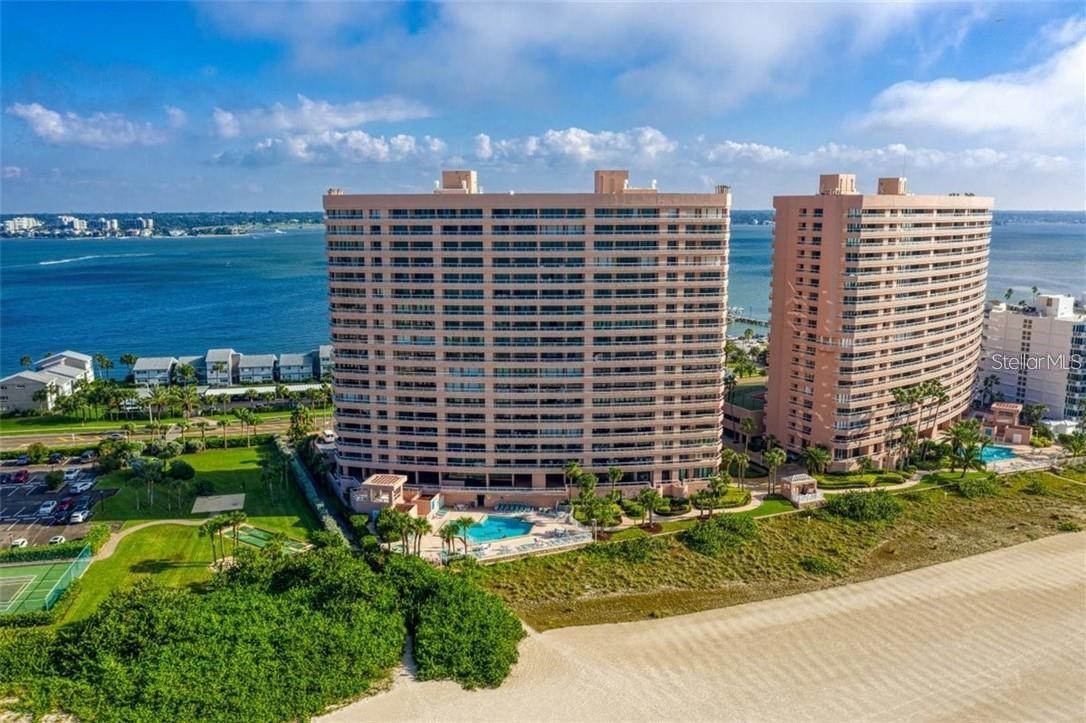 Short term rental available all-year-round *This renovated 20th floor penthouse unit is the jewel of Sandkey and Clearwater beaches. This is absolutely the finest unit available bc of its location, amenities, views from 5 balconies and recent updates. From the large living room, you have unobstructed 180 degrees west, east and north. Covered multifloor parking deck is conveniently located near the 8 elevators in the complex. In case you are still restless, unwind while watching movies or your favorite shows on the 65" flat screen TV. There is also a gourmet kitchen with two ovens, new appliances, granite counter tops, eat in area, and its own balcony perfect for enjoying coffee in the mornings. New large capacity washer/dryer in the unit. Marble and wood floors throughout w a spacious and open floor plan make this perfect for entertaining or simply unwinding from an adventurous day. There are a total of 3 bedrooms and 2.5 baths. Each bedroom has their own large flat screen TVs and private balconies where you can see directly to Tampa, Clearwater, and completely up and down the beaches. The master bedroom boasts a king size bed, walk in shower and Jacuzzi facing the beach for a sunset bath. The guest rooms have twin beds and also a queen bed with a Jacuzzi tub/shower facing the waters. This is a direct beachfront unit. Walking distance from the condo are shops and restaurants (world famous Columbia Restaurant, Dunkin Donuts, Ice Cream, Steakhouse, Italian, etc.)