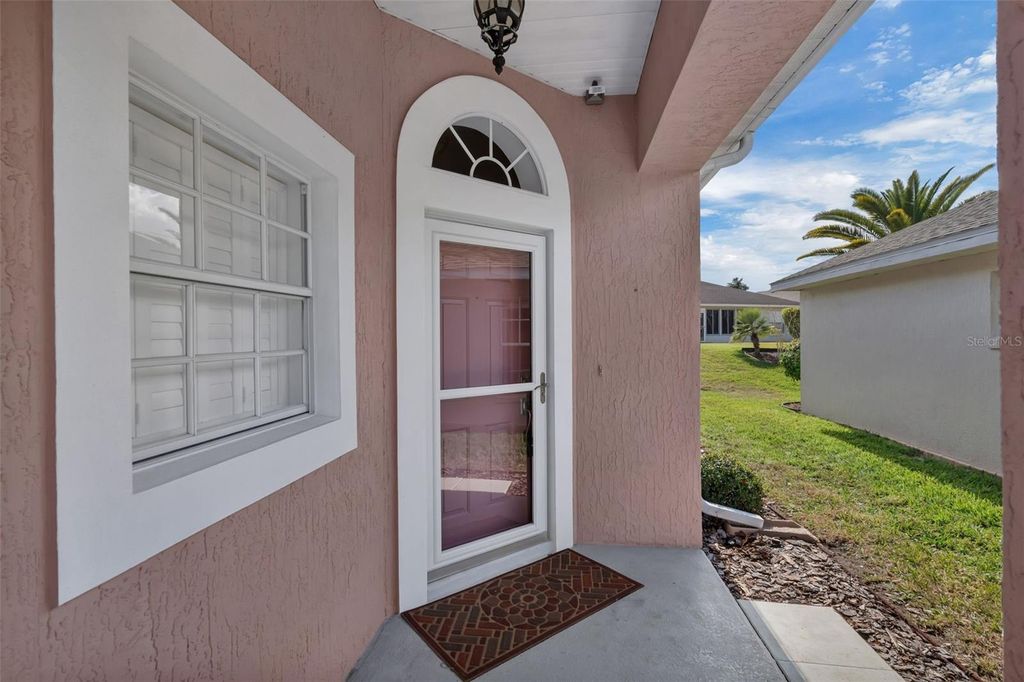 Photo of 213 High Vista Dr, Davenport, FL 33837 (MLS # O6377157)