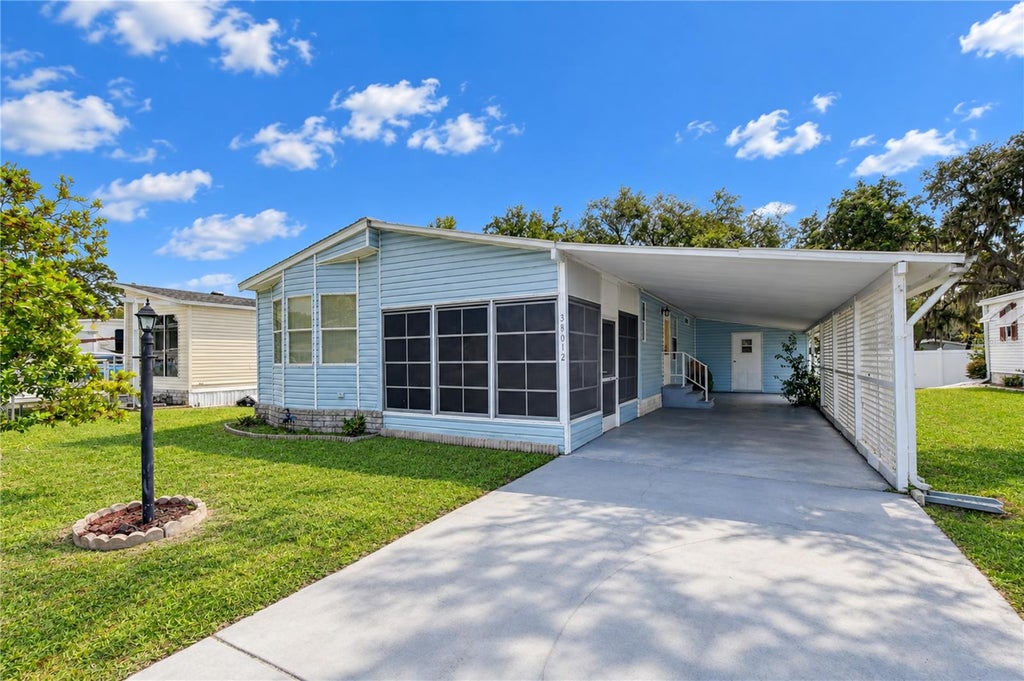 Photo of 38012 Lawanda Loop, Zephyrhills, FL 33542 (MLS # TB8553525)