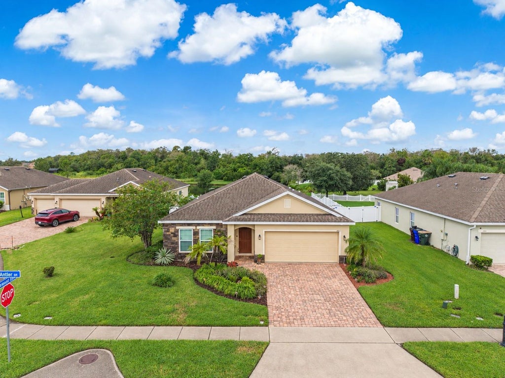 Photo of 1981 Antler Drive, Saint Cloud, FL 34772 (MLS # O6449160)