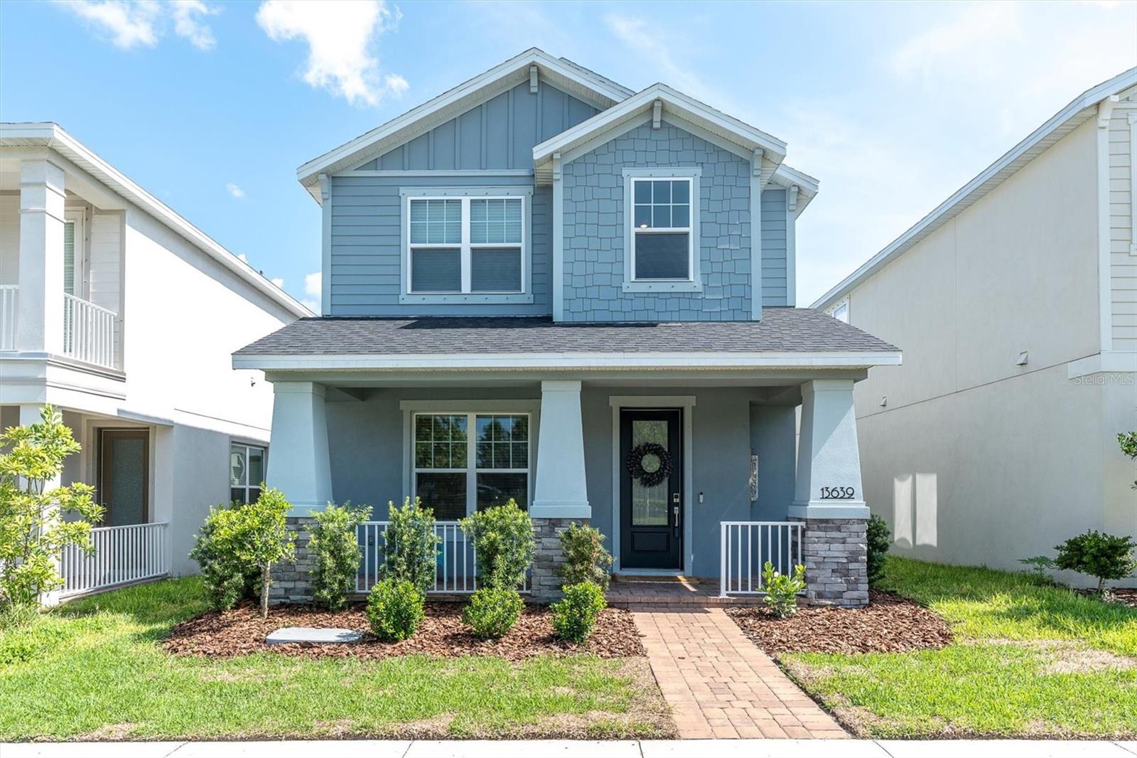 CHARMING NEWLY BUILT HOME IN DESIRABLE STARKEY RANCH ~ What a find!! Your Taylor Morrison NEWBERRY built in 2023 spans 2338 sqft on 2 stories offering 4 beds, 3.5 baths & 2 car rear alley garage, many upgrades and conveniently situated in the heart of Tampa Bay’s #1 most desired Master Planned community, Starkey Ranch. The curb appeal is enhanced by the upgraded Exterior featuring staggered shingles & horizonal & vertical siding, 3 columns with stone accents, 30 year Weathered Wood colored 3 dimensional Shingle Roof, manicured landscaping, paver walkway and a welcoming front porch lined with white metal fence providing space for seating and decorating. A glass inlay front door greets guests while the statement soaring ceiling and wood rail staircase capture your attention upon entering. Noteworthy upgrades include a Level 4 Wood Look Plank tile flooring in all main living areas, Clare doorbell, LED bulbs, wired for security, 8’ doors & neutral Sherwin Williams Agreeable Gray color paint throughout. To the right as you enter is bedroom 4 with ensuite bath & linen closet close by. The open floor plan unfolds as you enter the main living area. This gorgeous kitchen will impress with countless White Maple wood 42inch cabinets & drawers featuring Crown Molding in Dove Gray complimented by brushed nickel hardware, a striking tile backsplash, an abundance of Level 3 quartz counters all illuminated with recessed can lights. Stainless steel appliances that stay with the home include New gas range, microwave, dishwasher & designer Samsung Refrigerator. Extension Quartz Island offers space for 3-4 barstools ideal for entertaining. Adjacent to the kitchen is café dining with room for a small table set highlighted by 2 windows. The spacious gathering room is accented by can lights and even more windows with space to accommodate many furniture configurations. . A half bath for guests offers pedestal sink & decorative mirror. Follow the wood spindle staircase to the second story. A small nook could be a good location for a desk or reading nook. The spacious Primary Retreat will impress with multiple windows and view of the trees, tray ceiling & can lights. Master ensuite is accented by oversized walk-in shower, his & her vanity’s with level 3 quartz counters, tile floors & walk in closet. Bedroom 2 and br 3 are adjacent to bathroom 3 with tub shower combo. The 2nd story laundry room includes the washer & dryer. Off the living room, a door leads to upgraded extended covered Lanai providing shady spaces to relax. This will be the perfect spot to have morning coffee, BBQ on weekends or sip a cocktail. A fully fenced small yard is the perfect place to play or garden. Additional features include: *Fresh landscaping * Epoxy & extended driveway* Tankless hot water heater* Award winning Starkey Ranch offers K-8 Magnet School w/ specialties in Computer Science, Fine Arts & World Language. Theater, Library, 3 community pools, 3 playgrounds, 3 dog parks, 20 mile trails, community center & events for all ages. Directly across street from Publix & shoppes! Close to restaurants, beaches and easy commute to Tampa airport. Make your move! This is Home!