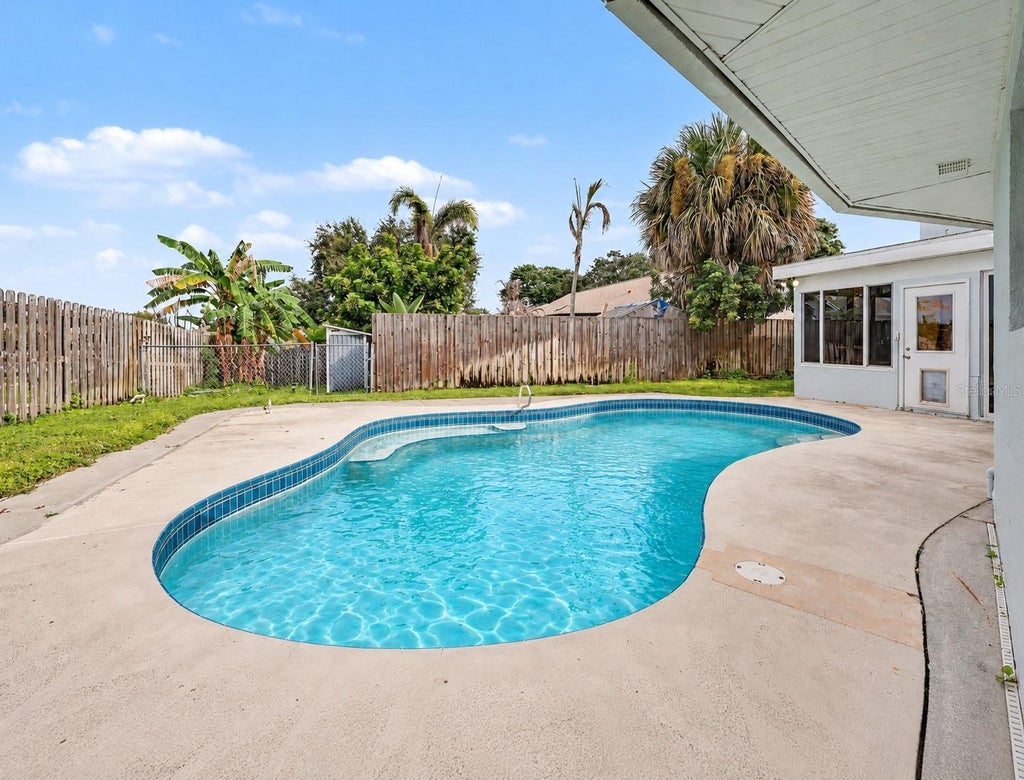 Photo of 2700 Raintree Lake Circle, Merritt Island, FL 32953 (MLS # TB8554826)