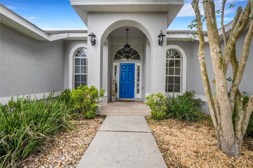Photo of 8722 Fort Socrum Village Place, Lakeland, FL 33810 (MLS # L4962713)