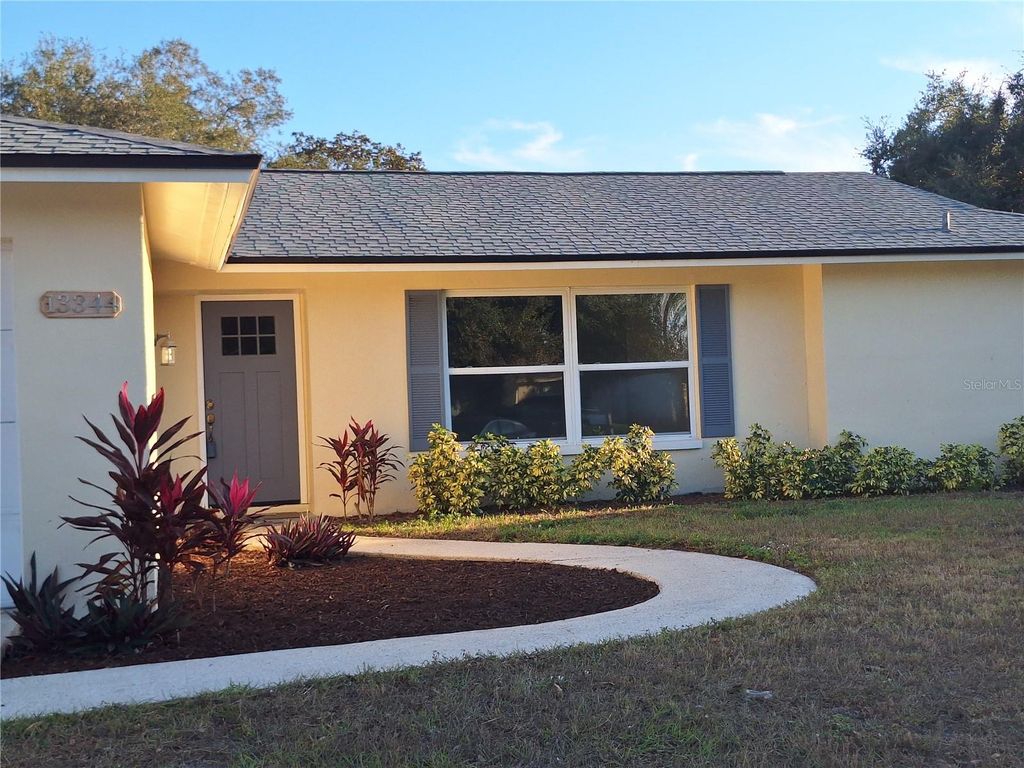 Photo of 13344 Sorrento Drive, Largo, FL 33774 (MLS # TB8451612)