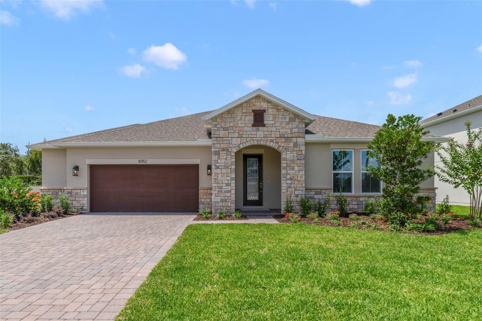 READY NOW! Welcome to this beautifully designed 4 Bedroom, 3 Bath, Energy Star Certified single-family home, offering modern finishes, an open-concept layout, and quality craftsmanship. This home features a chef-inspired kitchen with granite countertops, stainless steel appliances, and 42" cabinets. The kitchen flows seamlessly into a bright and airy living space. You'll find the spacious primary bedroom complete with a walk-in closet and a semi-frameless shower. Three additional bedrooms, three full bathrooms, and a convenient laundry area. Enjoy the ease of a 3-car garage and in a prime location near shopping, dining, and major highways. **Interior and exterior images contain renderings, actual finishes may vary.**