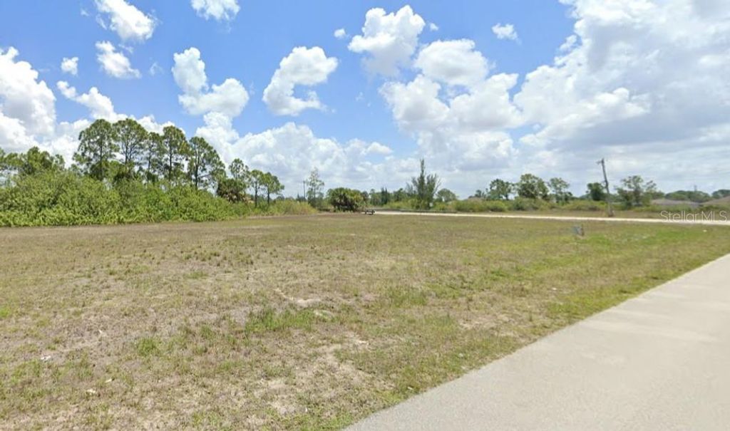 Photo of 845 NE 38 Th Terrace, Cape Coral, FL 33909 (MLS # O6291744)