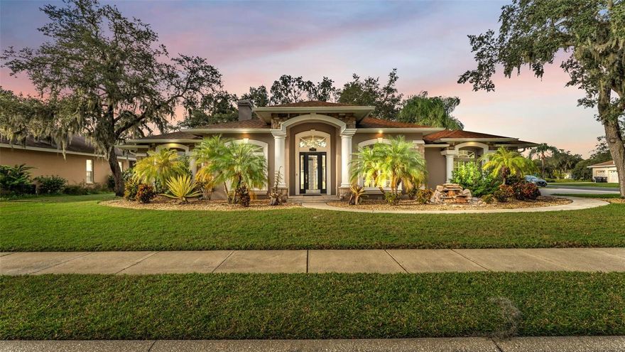 Experience the perfect blend of craftsmanship and modern comfort in this custom-built Parade of Homes winner, offering 4 bedrooms, 3 baths, and over 3,300 sq. ft. of living space. Originally designed as the builder’s own residence, this property showcases meticulous attention to detail and thoughtful design throughout.

Inside, you’ll find brand-new flooring, elegant crown molding, decorative columns, and soaring ceilings that create an inviting sense of space and style. The well-planned split-bedroom layout features a primary suite on one side and a second ensuite with pool access on the other, ideal for guests or multi-generational living. A private home office provides additional versatility for today’s lifestyle.
At the heart of the home, the open living spaces seamlessly transition to a resort-style outdoor retreat. Enjoy a gorgeous pool with waterfalls and built-in outdoor kitchen that makes for an entertainers dream.

This home has been extensively updated, including a new roof, new HVAC system, new tankless water heater, and new flooring throughout. Additional highlights include a 3-car garage with EV hookup, water softener, outdoor shower, and two storage sheds.
Set on nearly half an acre in one of Lakeland’s most desirable neighborhoods, this home offers the perfect balance of elegance, functionality, and everyday luxury.