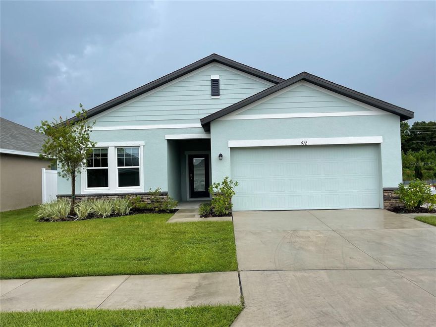 Builder's former model home! High vaulted ceiling in the living room! Luxury vinyl plank floors throughout! Located in the Shell Cove community of Ruskin, this modern single-family residence offers a functional open-concept layout designed for comfortable everyday living. The home features bright living spaces that connect the main living room, dining area, and kitchen.

The kitchen is equipped with modern appliances, ample cabinet storage, and generous counter space for meal preparation and entertaining. The bedrooms are well-sized, including a primary suite with a walk-in closet and private en suite bathroom.

Shell Cove residents enjoy access to community amenities including a swimming pool, clubhouse, open-air cabana, pickleball courts, basketball court, playground, dog park, and scenic pond and lake views throughout the neighborhood.

Conveniently located near US-41 and I-75, the property offers access to Tampa, St. Petersburg, Bradenton, local marinas, parks, nature preserves, shopping, dining, and Gulf Coast beaches.

This home offers a modern layout, community amenities, and a convenient Ruskin location. Schedule your private showing today.