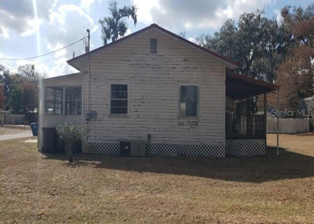 Photo of 706 S Walnut Avenue, Fort Meade, FL 33841 (MLS # O6384813)