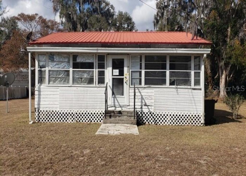 Photo of 706 S Walnut Avenue, Fort Meade, FL 33841 (MLS # O6384813)