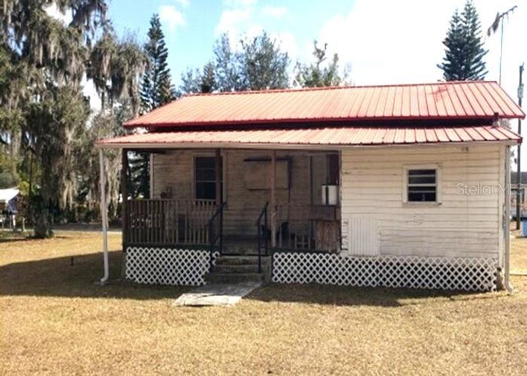 Photo of 706 S Walnut Avenue, Fort Meade, FL 33841 (MLS # O6384813)