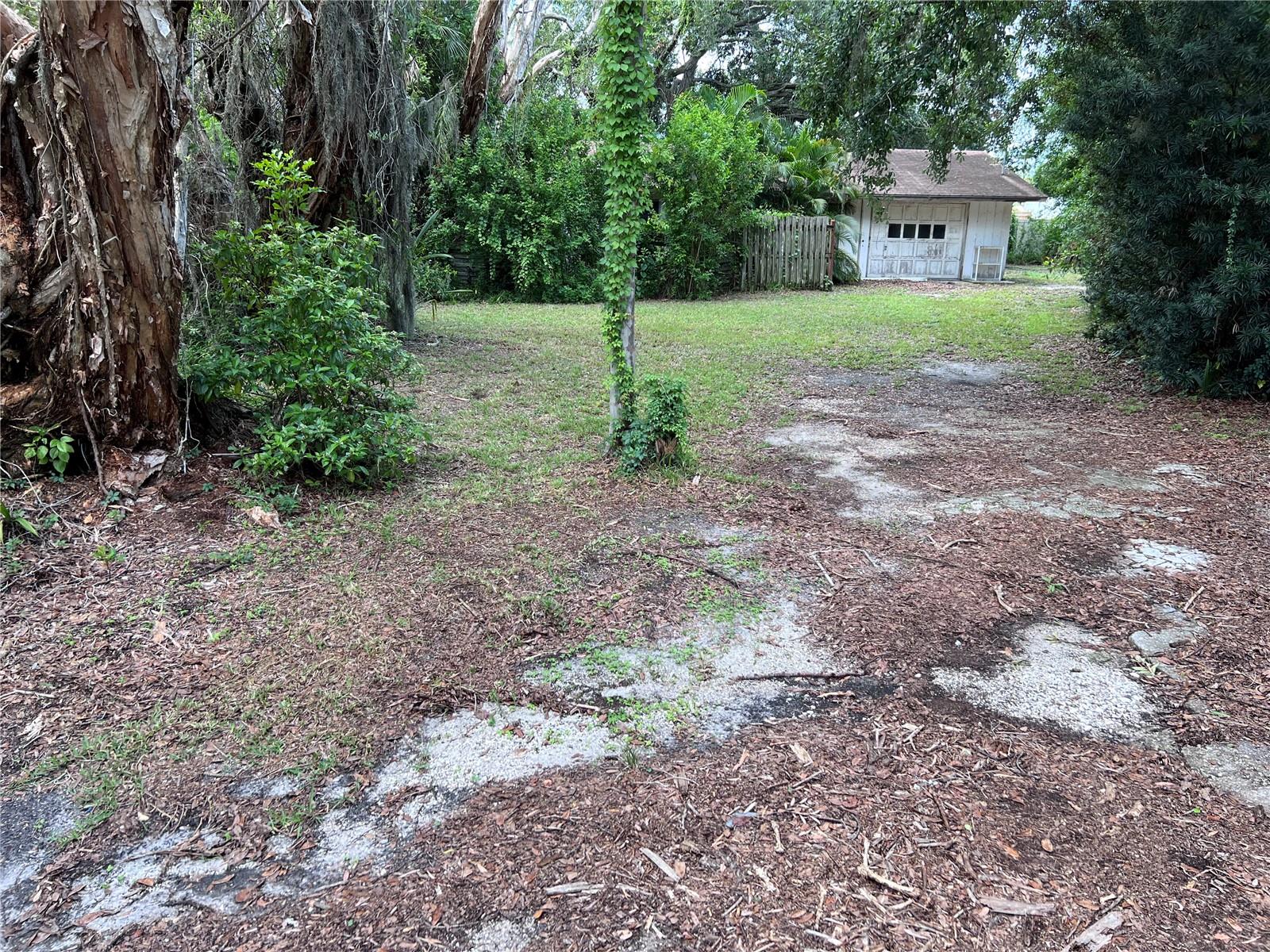 Charming, shaded, tranquil lot located in mature neighborhood near the center of Sarasota. No HOA dues, CDD fees, or deed restrictions! 115' deep x 69' wide, .18 acre, 7,903 sq ft lot with detached block garage with electricity connected that was used as a workshop, being sold for land value. 5 miles to famous quartz sand Siesta Key Beach, 2 miles to Red Bug Slough Preserve with ponds, fishing pier, and nature paths, and is in highly-rated Riverview High School District. Under current zoning, lot is nonconforming and is thus an unbuildable lot and the detached block garage can not be rehabilitated or used for anything but contact Sarasota County Zoning Department to inquire about how to apply to request rezoning of the property to become buildable.