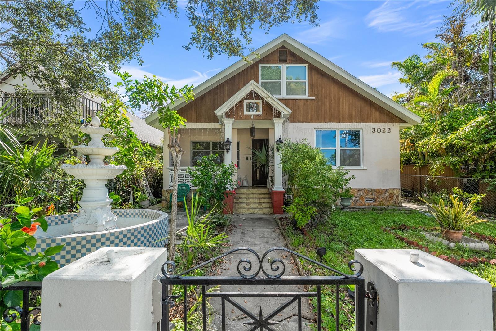 Step into a world of endless possibilities with this unique and versatile triplex property, featuring a spacious main house with 5 bedrooms and 3 bathrooms and a detached duplex in the rear, all nestled on a generous lot in a character-filled neighborhood. Built in 1925, this property is bursting with original charm and architectural details that tell a story, offering the perfect canvas for someone with a vision to restore and modernize while preserving its timeless appeal. The main home boasts five true bedrooms and three full bathrooms, offering ample space for everyone or the savvy investor looking to house-hack. Original woodwork, vintage hardware, and high ceilings throughout create a sense of warmth and nostalgia that simply can’t be replicated in newer builds. While the home needs work, the bones are solid, and with thoughtful renovation, this house could easily become the showpiece of the block. Tucked behind the main residence is a fully detached duplex, offering incredible rental income potential. The downstairs unit features 2 bedrooms and 1 bathroom, ideal for small families or roommates. The upstairs unit is a charming 1 bedroom, 1 bathroom retreat—perfect for a traveling nurse, college student, or Airbnb guest. Both units are separately metered and have private entrances for maximum privacy and flexibility. Whether you're an investor looking to generate multiple streams of income, a homeowner who wants to live in one unit and rent the others, or someone seeking a compound, this property checks every box. Live in the main house and let the duplex cover your mortgage—or reside in one of the smaller units while updating the main house at your own pace. Recent updates include new roofs on both the main house and duplex in 2024, offering peace of mind and a great head start on future improvements. With some TLC and a touch of creativity, this property could become a true standout in the neighborhood. Don't miss your chance to own a piece of history with massive income potential. This is your chance to invest in a rare multi-unit property just moments from Gulfport Beach, the marina, local galleries, nightlife, and more. Schedule your showing today and unlock the potential of 3022 Beach Blvd!
