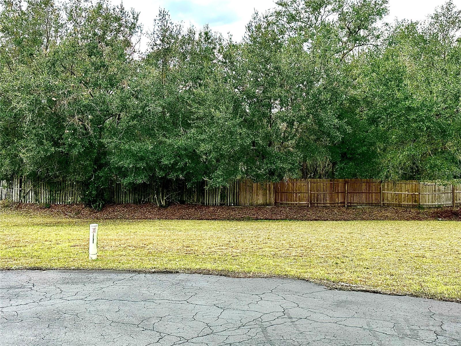 Location, Location, Location!! Vacant lot in Oakridge 55 and better community is waiting for you! All you have to do is pick your dream home and set it right here. This cleared lot is located in a community with a clubhouse, pool and close to shopping and easy access to The Villages and all of central Florida's attractions. Go pick your manufactured or double wide home and start enjoying life here in Leesburg!