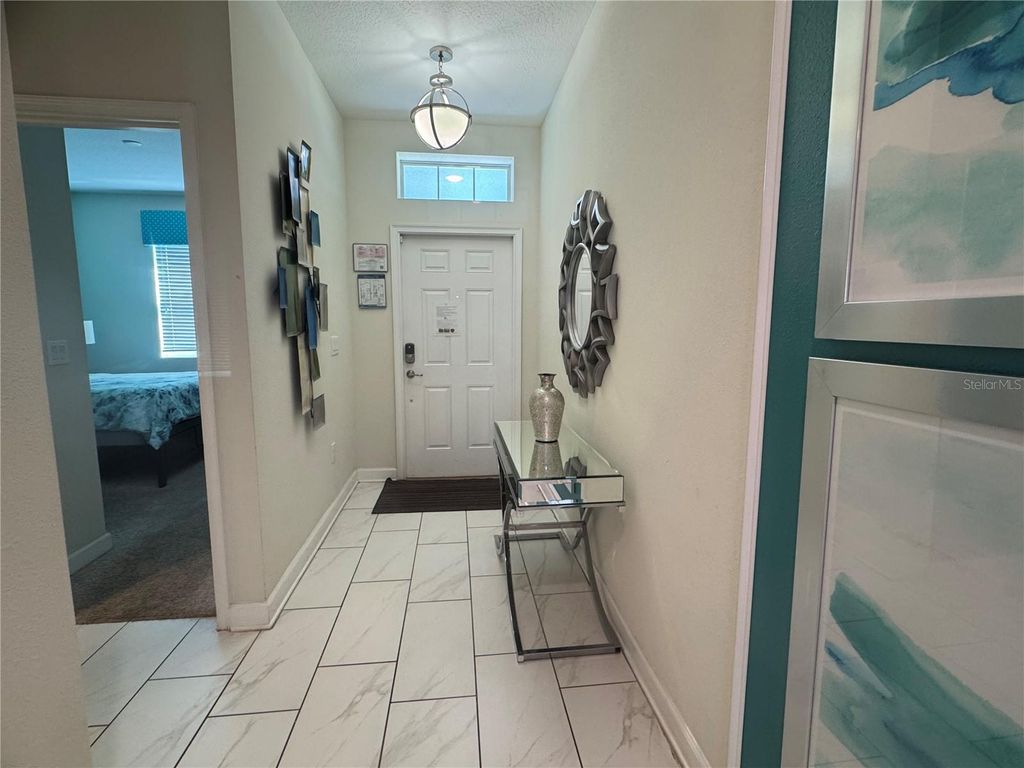 Photo of 1580 Tempo Lane, Davenport, FL 33896 (MLS # O6390386)