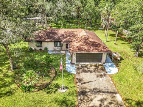 Photo of 1416 Honeytree Street, Bunnell, FL 32110 (MLS # FC313624) Photo of 1416 Honeytree Street, Bunnell, FL 32110 (MLS # FC313624)