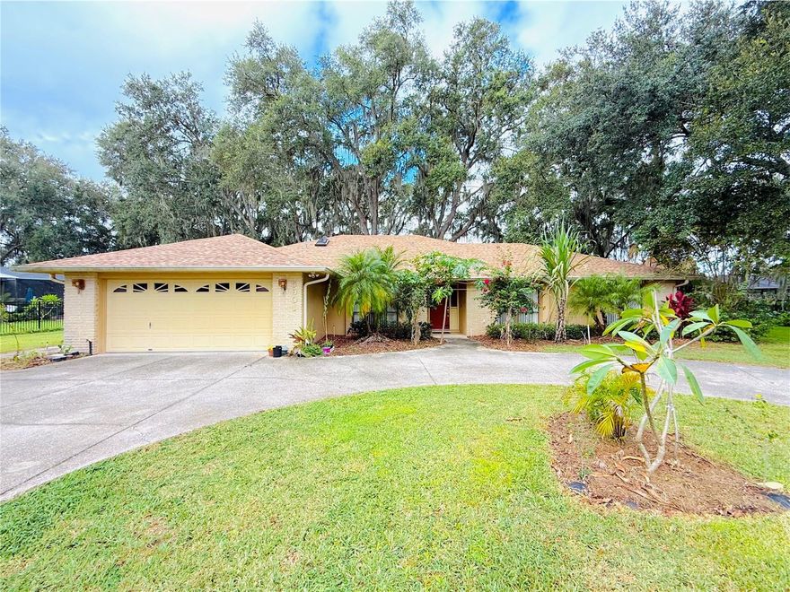 Welcome Home to Peaceful Deer Brooke Living!

Escape to over 2,000 sq. ft. of tranquil bliss in this beautifully maintained 3-bedroom, 2-bathroom home, perfectly situated on nearly a half-acre lot in the highly desired Deer Brooke neighborhood.

Step inside to a bright and spacious living room, formal dining area, and soaring vaulted ceilings that create an open and inviting feel throughout. The primary suite is thoughtfully positioned on the left side of the home for added privacy, featuring a large walk-in closet and a relaxing ensuite bathroom. On the opposite side, you’ll find two comfortable guest bedrooms and a full bath.  Ideal for family or visitors.

Enjoy the convenience of a wrap-around driveway, two-car garage, and separate laundry room for easy everyday living. Outside, relax in the large screened-in patio overlooking a beautiful, tree-lined backyard with no rear neighbors.  Your private retreat awaits.

Recent updates include a new roof and water heater (2024), offering lasting peace of mind.

Located in a quiet, well-established neighborhood, you’re just about an hour from Florida’s stunning Gulf beaches, Downtown Tampa, and Orlando’s world-famous attractions.

Don’t wait, homes like this in Deer Brooke don’t last long! Schedule your private showing today and experience the comfort and charm this home has to offer.