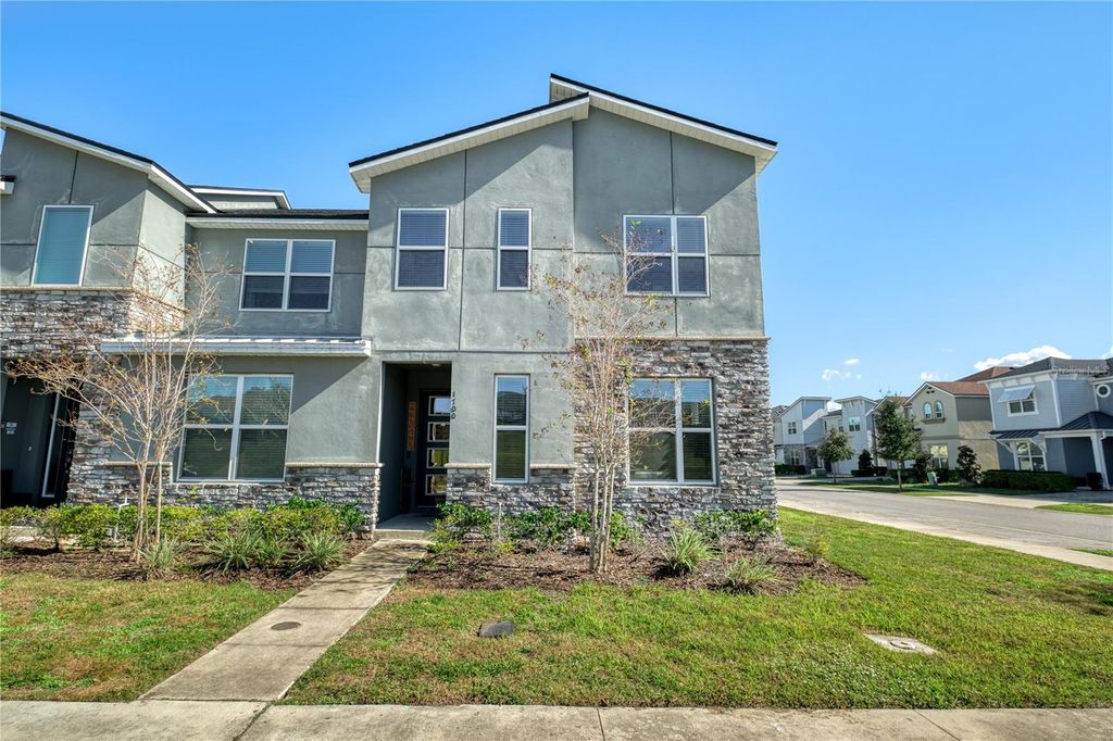 Photo of 1700 Tropical Palms Circle, Kissimmee, FL 34747 (MLS # O6368599)