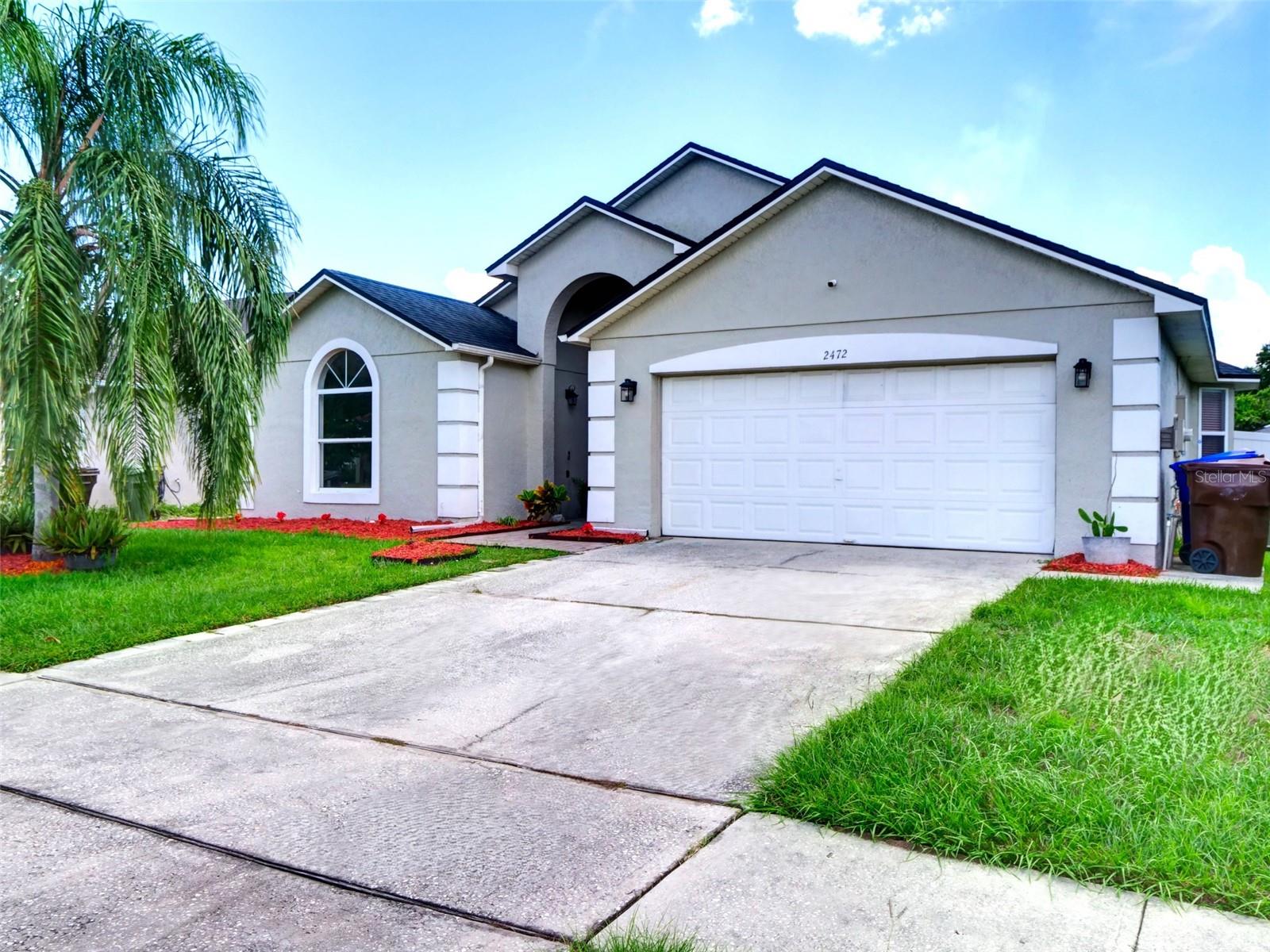 Beautiful 4 Bedroom, 2 Bath Pool Home in Kissimmee! Step into this spacious screened-in pool home featuring a thoughtfully designed layout with separate formal living and dining rooms. The large kitchen boasts granite countertops, ample cabinetry, and a cozy dinette area—perfect for family meals or entertaining guests. Enjoy no carpet throughout, making maintenance a breeze! The master suite offers a spa-like retreat with dual granite vanities, a relaxing jacuzzi tub, and a separate shower. High cathedral ceilings enhance the airy feel of the home. The fully fenced backyard offers privacy and includes three storage sheds for added convenience. Ideally located near Lake Nona, Orlando International Airport, and the VA Hospital—plus an incredibly low HOA fee! Priced to sell—don’t miss this opportunity!