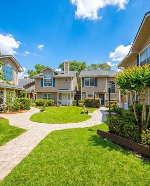 Photo of 6050 Scotchwood Glen #105, Orlando, FL 32822 (MLS # O6385718)