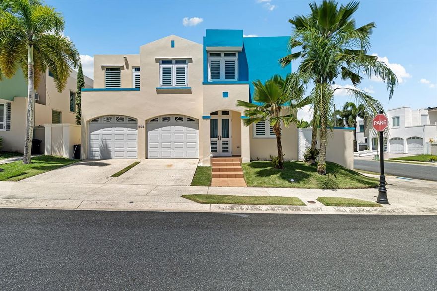 This house is located in Rio Grande town. The two story property has 5 bedrooms and 4.5 baths. Great corner swimming pool and patio for recreation. Gated community with access directly to Road #3 that goes to the east of the Island. Features renovated with hurricane shutters and windows. Bar area for entertainment and storage. A bigger master bedroom was built with walking close and a full bath with external access stairs, that can be used as a separate apartment. This community is beside Canovanas Outlets and easy access from Route 66.