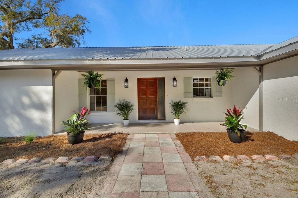 Photo of 570 Cass Street, Deland, FL 32720 (MLS # V4947376)