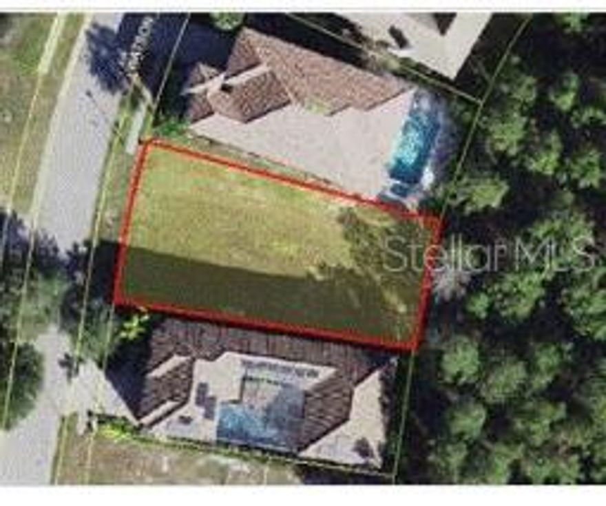 BEST PRICED LARGE LOT IN REUNION AND BUILDING PLANS AVAILABLE ** MASSVE FRONTAGE"" They don't make lots this size anymore and especially at this price.  YOU CAN HAVE A SCREEN ON YOUR POOL on this lot if you desire!  This rare find is in the ultra-exclusive Reunion Resort. Look at that FRONTAGE! This lot is on a very private tree lined street in Reunion with no through traffic and capped off by a cul-de-sac.  Close to Reunion Grande, and Golf! Easy to access and allowed to walk the lot. BUILD WHEN YOUR READY! Approved builders list is available. See attached sample floor plans.  Can build to suit your needs.  Full time, part time or vacation home opportunities. Come find out why Reunion!****REUNION MEMBERSHIP ATTACHED TO THE LOT****