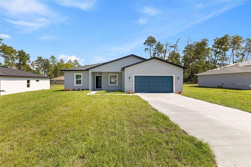 Photo of 5207 SW 165th Street Road, Ocala, FL 34473 (MLS # O6349625)