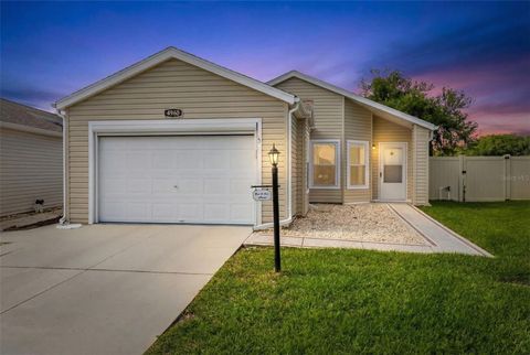 Photo of 4960 Heron Run Circle, Leesburg, FL 34748 (MLS # O6396736)